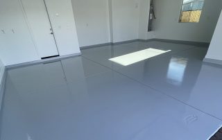 Line-item estimate example for a two-car garage with epoxy base and polyaspartic topcoat by AZ Garage Floors. Click to request your own personalized quote.