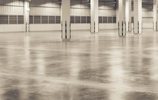 Durable commercial epoxy floor by AZ Garage Floors, showing smooth and seamless surface. Call (602) 254-3363 to schedule your consultation today and extend your floor’s lifespan.