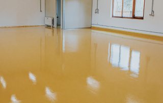 Customizable solid color epoxy floors by AZ Garage Floors. Call (602) 254-3363 to schedule a free consultation and design your perfect garage, workshop, or commercial floor.
