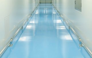 High-durability solid color epoxy flooring designed for garages and commercial spaces—call (602) 254-3363 today to schedule a consultation and upgrade your concrete floors with a long-lasting epoxy coating system.