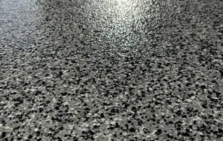 Granitex epoxy floor coating by AZ Garage Floors with a textured full-flake finish designed to resist scratching and peeling—call (602) 254-3363 to schedule your free consultation today.