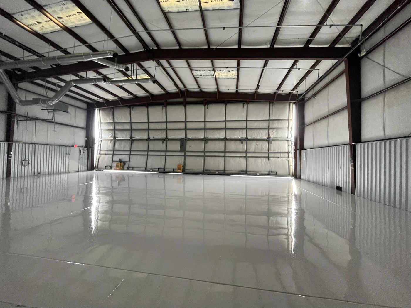 Warehouse and hangar floor by AZ Garage Floors